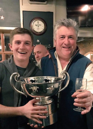 Paul Nicholls with trophy in a pub_credit Paul Nicholls website