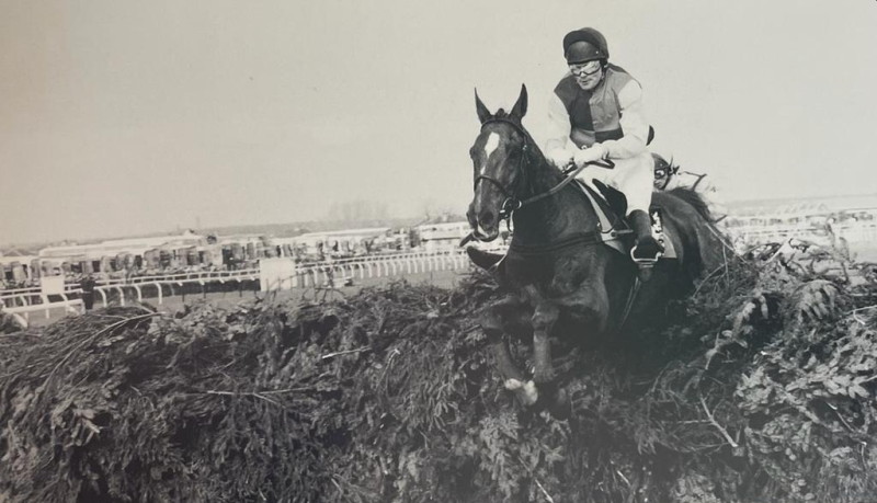 Mr Frisk and Mr Marcus Armytage 1990 riding over the last jump of the race