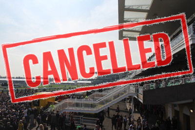 grand national stands with spectators and cancelled stamp overlaid